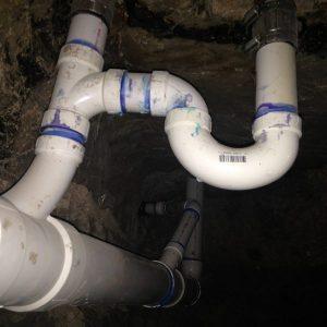 fixing plumbing under foundation